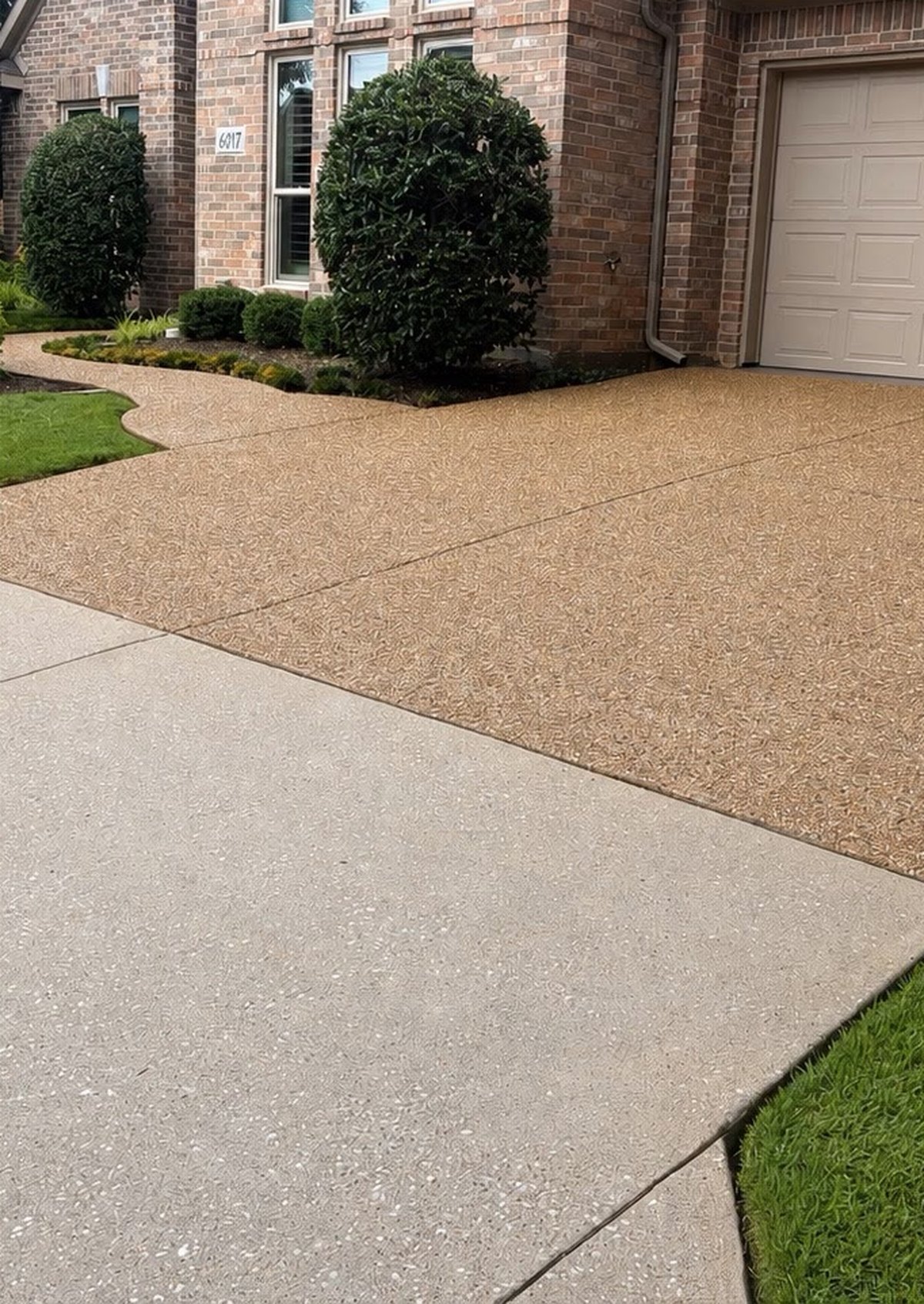 Exposed aggregate driveway restored to its original tan color after hot-water pressure washing in McKinney, Texas — Green Clean Machine
