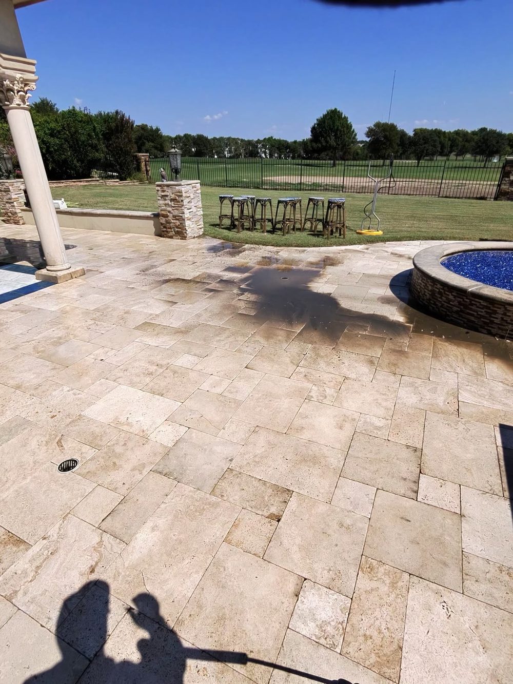 Travertine pool deck pressure washing in Prosper, Texas — Green Clean Machine