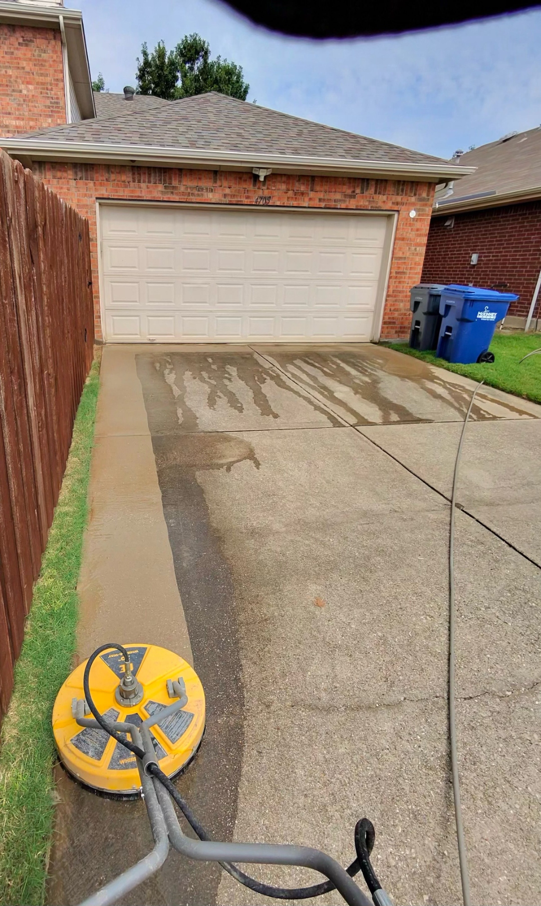 Action shot of driveway cleaning