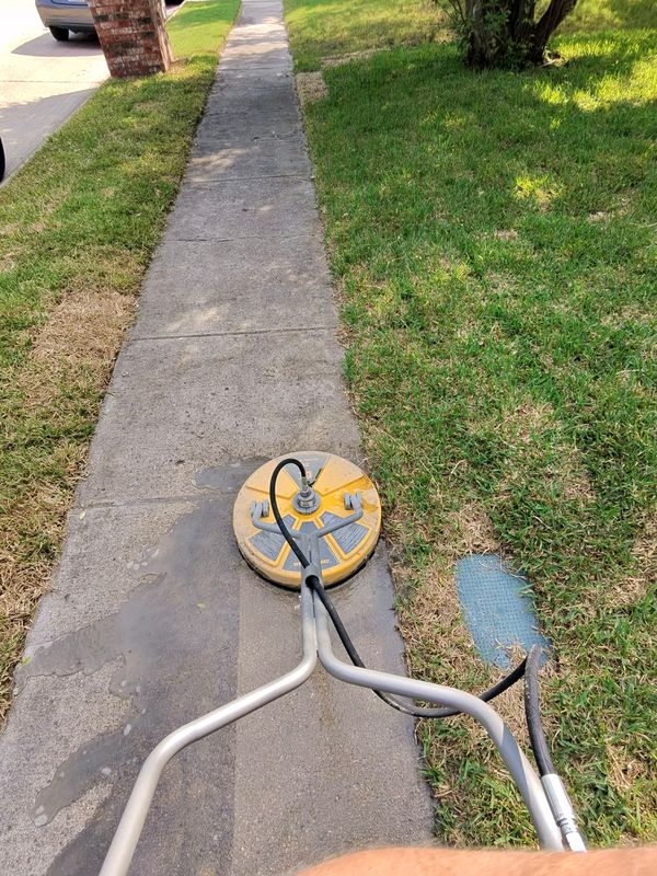 Action shot of sidewalk cleaning