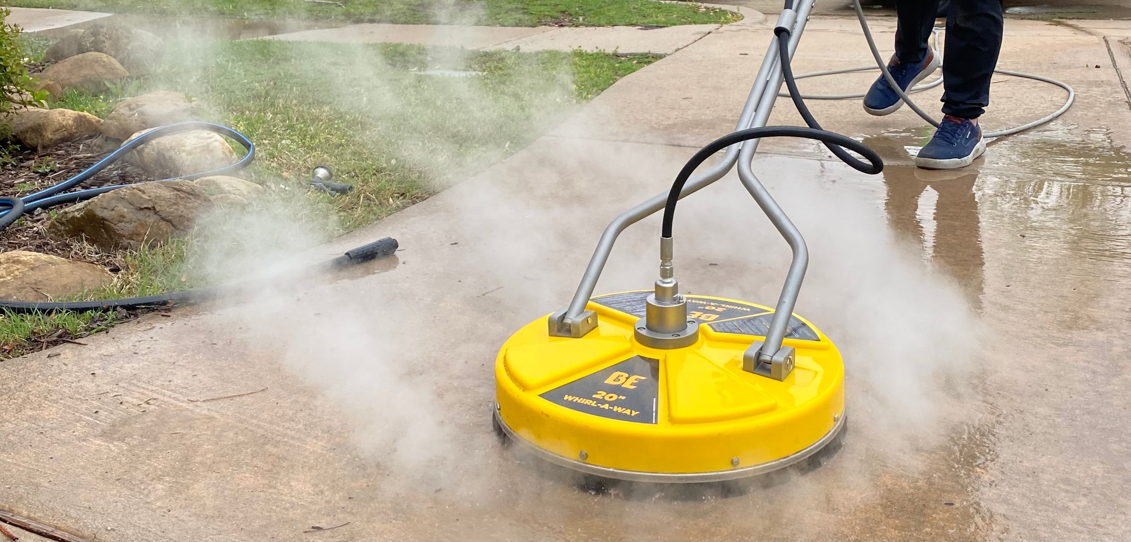 Action shot of pressure washing with steam