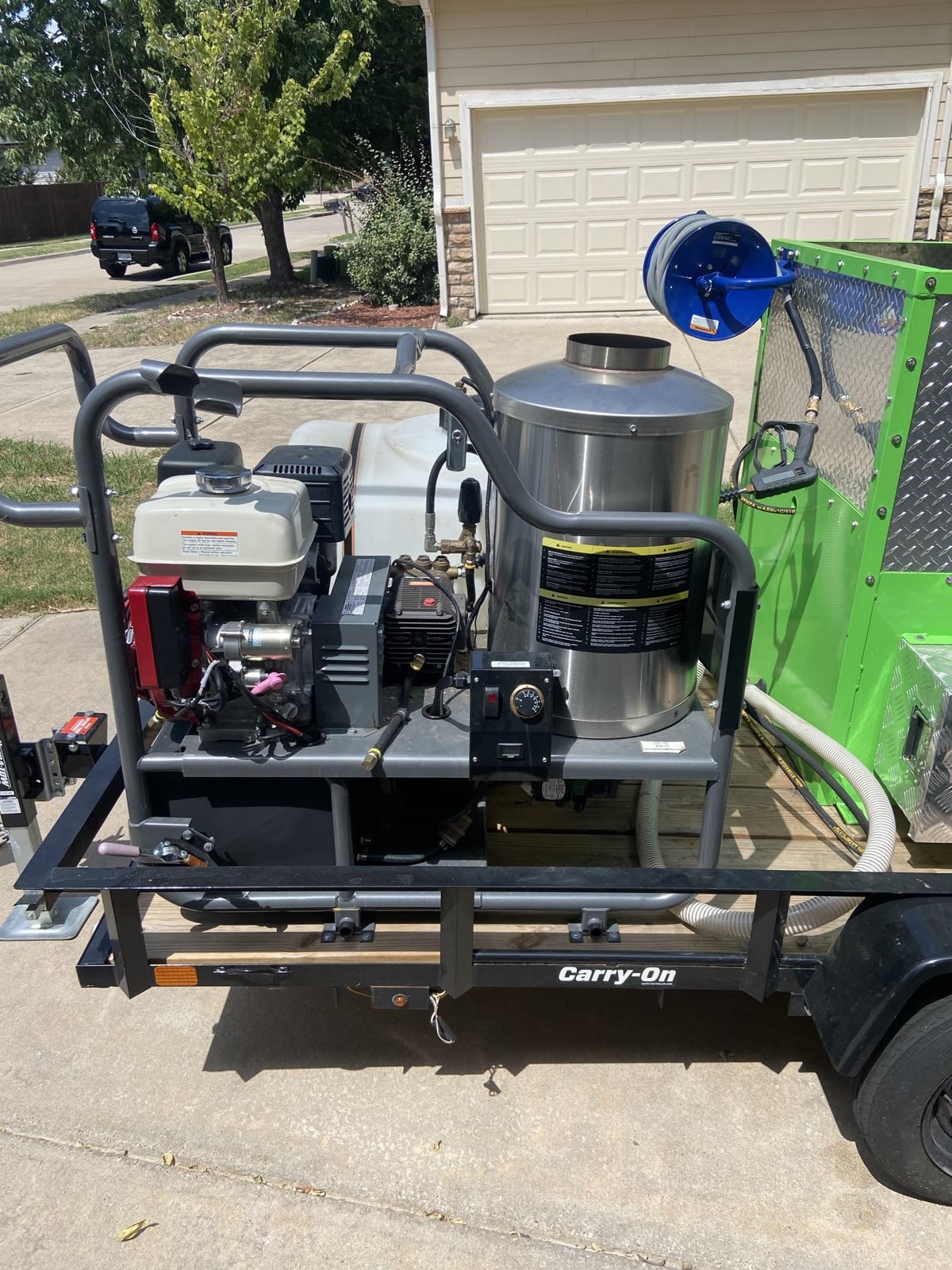 Green Clean Machine truck and trailer used for hauling and odd jobs in Collin County, Texas